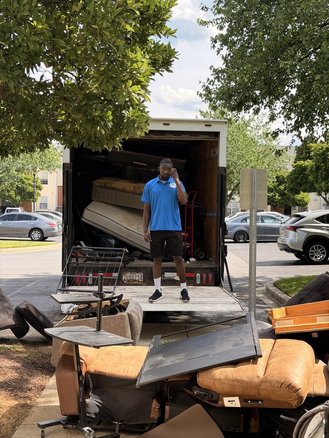 Mattresses and furniture staged at the liftgate